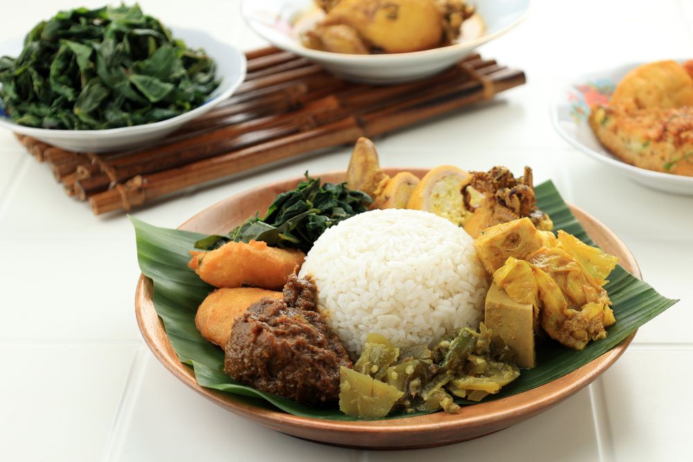 Nasi Padang or Nasi Kapau with Rendang, Sambal Ijo, and Squid Curry
