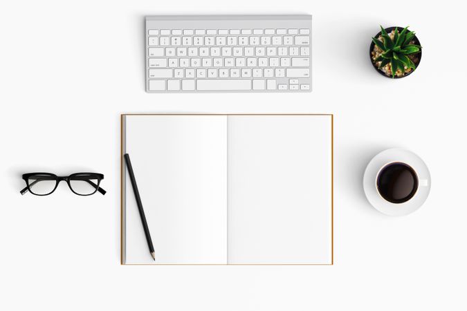 Modern workspace with coffee cup, smartphone, paper, tablet and notebook copy space