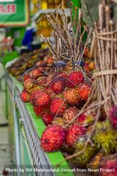 Bunch of lychee fruits for sale in grocery market 4BamKB