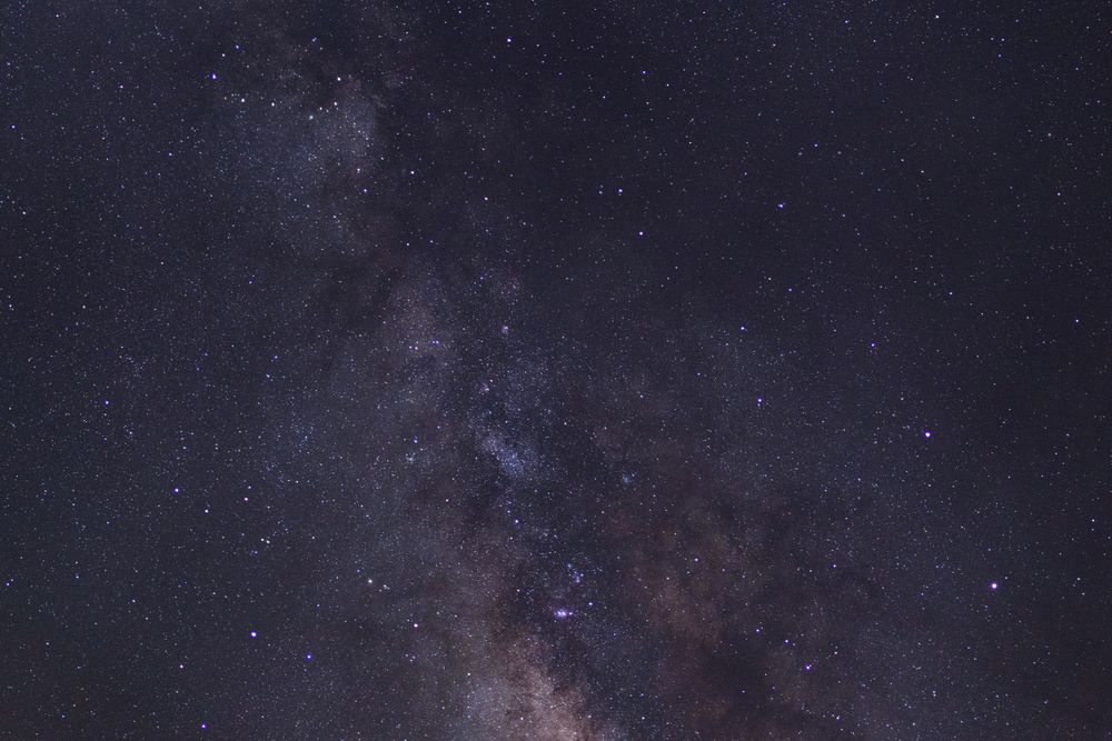 Starry night sky and milky way galaxy with stars and space dust in the universe