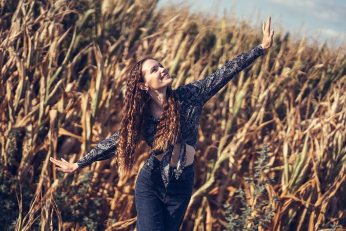 Joyful Dance in a Golden Cornfield, celebrating the beauty of nature and carefree moments