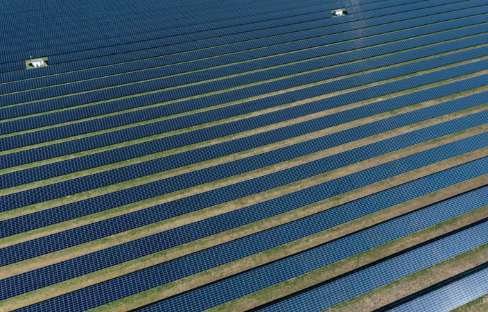 Immense solar panels farm in Heilbronn, Germany, drone aerial view