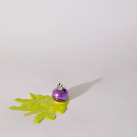 Purple Christmas decoration with shadow with green abstract tree