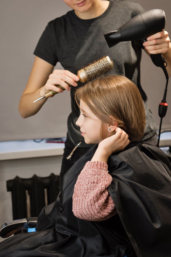 Child Modeling a Bob Haircut