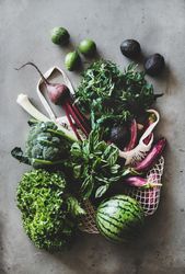 Fresh produce, top view, vertical composition with mesh bag, vertical composition
