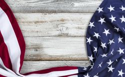 Cloth USA Flag on light age wood