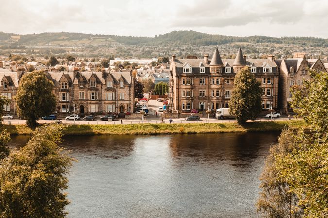 Medieval building next to small river in Scotland