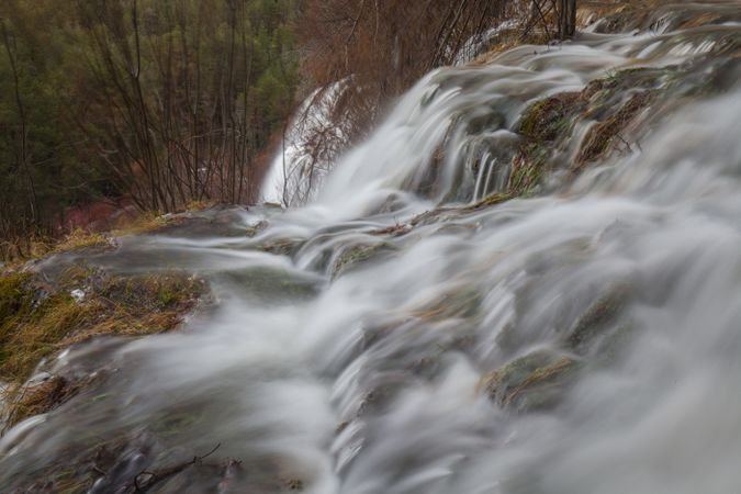 Wonderful waterfall near tree