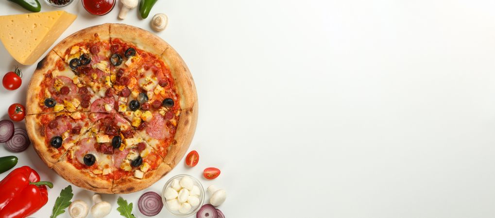 Tasty pizza with meat and ingredients on plain background