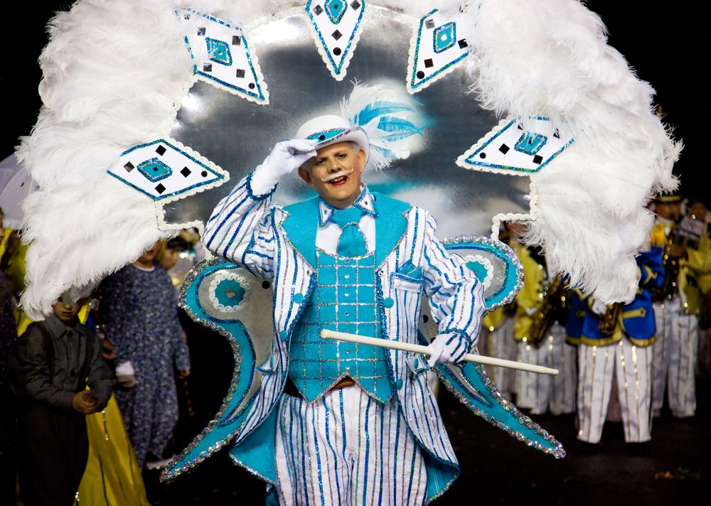 Costumed man with marching band at Mummer's Parade 2011, New Years day in Philadelphia, Pennsylvania