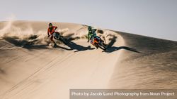 Motocross competition over dunes in desert 0WdD65