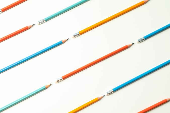 Flat lay composition with pencils on blank background, space for text