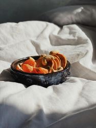 Bowl of orange slices for breakfast in bed