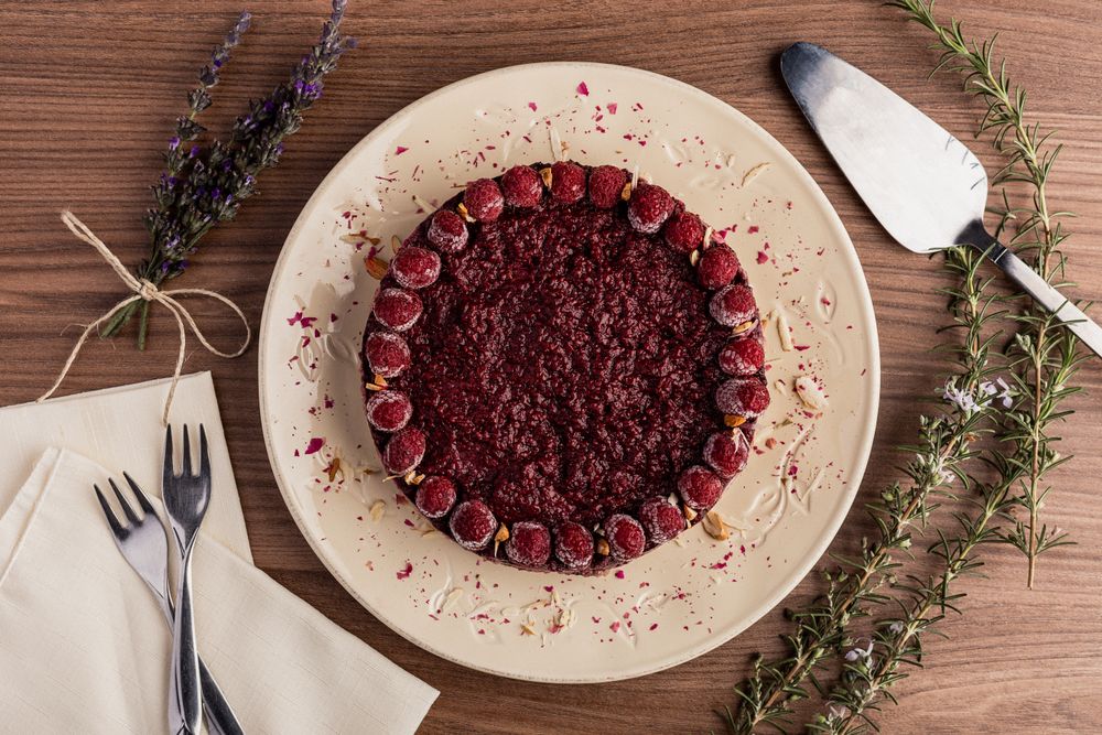 Fruit berry pie and branch of lavender on table