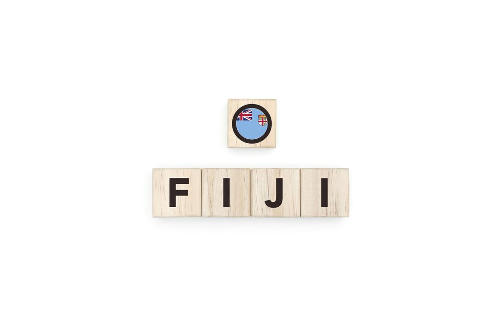 Wooden blocks bearing the name and flag of Fiji.