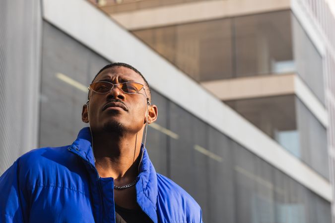 Stylish Black man in sunglasses on street