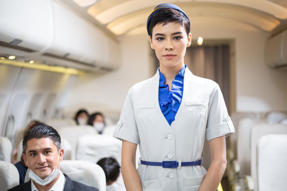 Flight attendant in airplane