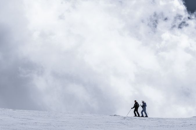 Men skiing on winter day