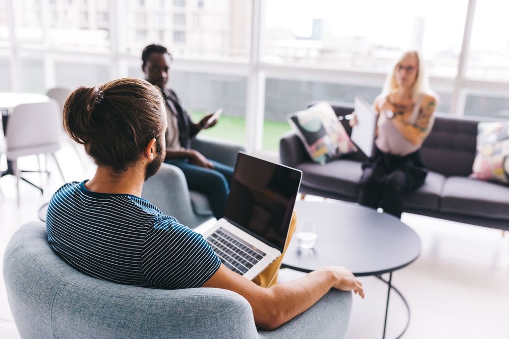 Group of colleagues working together at an office