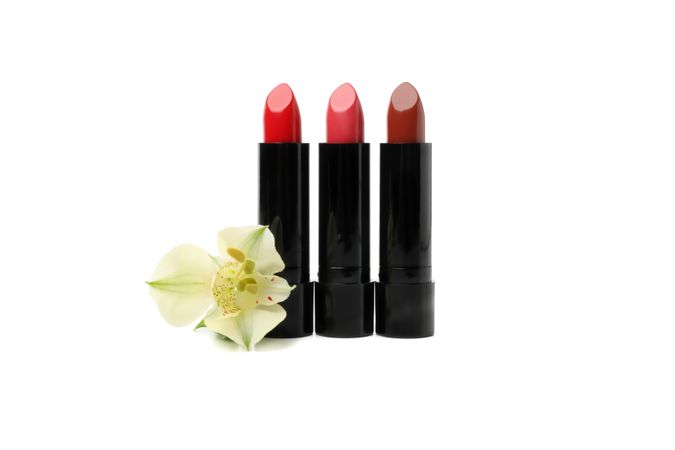 Lipstick isolated on plain background. Cosmetics. Female accessories
