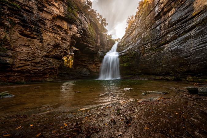 Fantastic waterfall on cloudy day in countryside