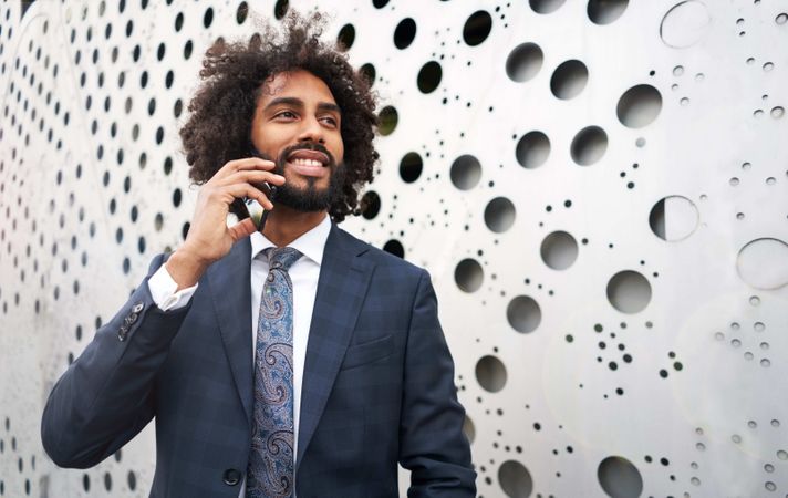 Presentable businessman during phone conversation