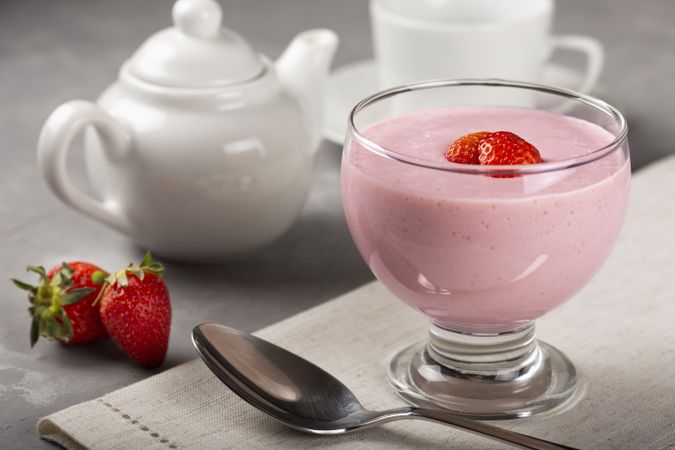 Delicious strawberry mousse in glass goblet.