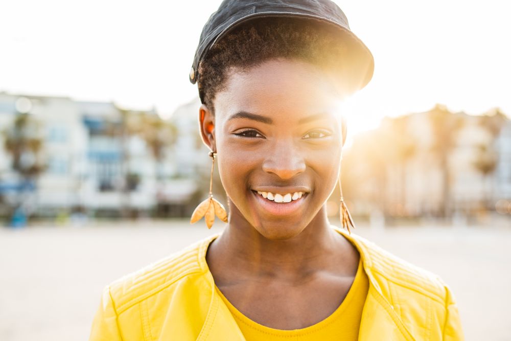 Joyful female smiling at camera
