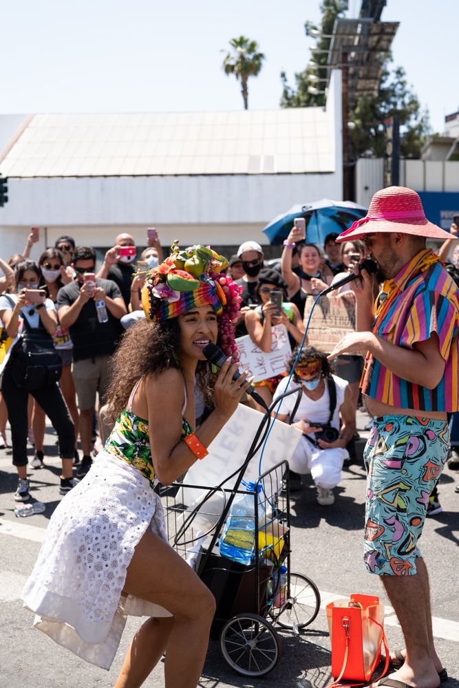 Los Angeles, CA, USA — June 14th, 2020: person singing for a crowd on the street at protest