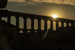 View of the famous Aqueduct of Segovia at Sunset