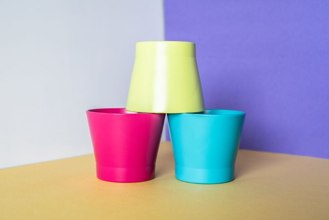 Multicolor vases in a colorful background