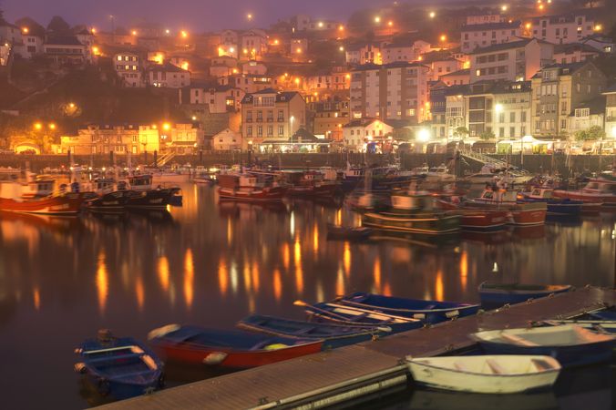 City port in bright evening lights