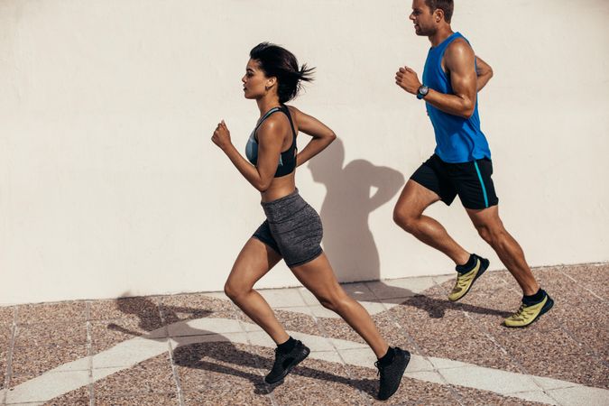 Man and woman jogging together