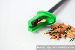 Green pencil sharpener with shavings & copy space 0WO8qj