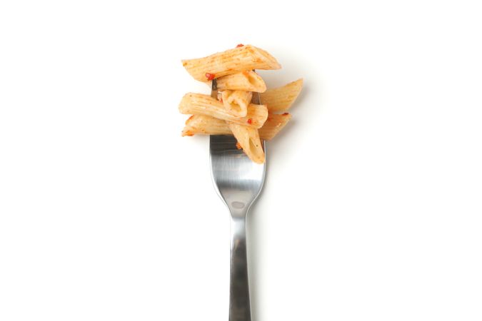 Fork with tasty pasta isolated on plain background