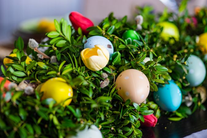 Easter holiday card concept with close up of lush centerpiece