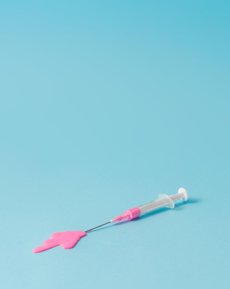 Syringe with pink paint