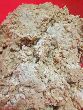 Boiling Yellow Soybeans in a Traditional Pot