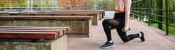 Young woman training with dumbbells
