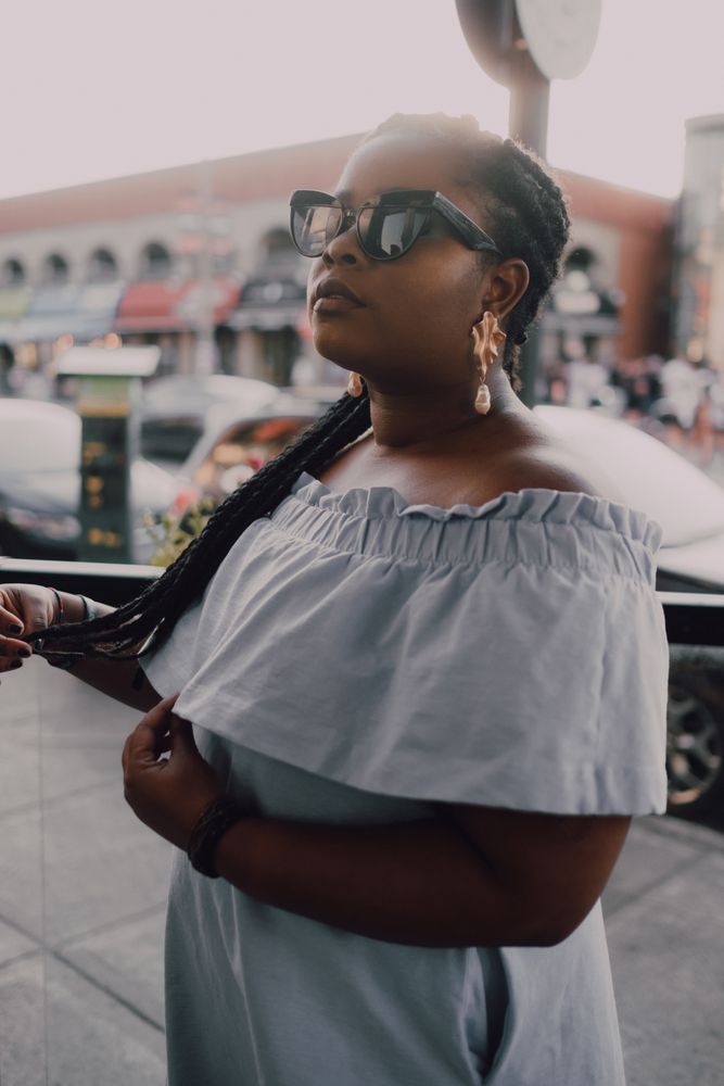 Content trendy Black woman on street