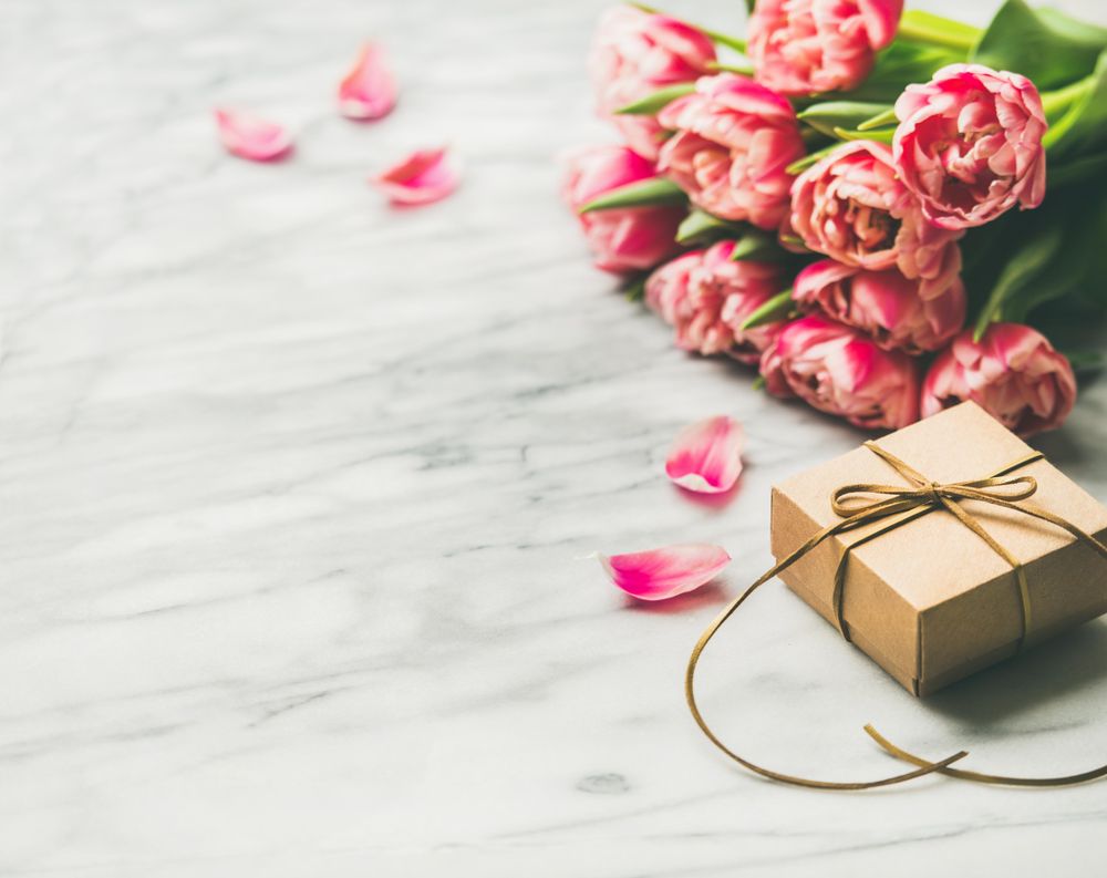 Pink tulips and gift box with copy space
