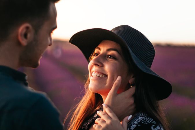 Young couple on a romantic date in a lavender field.