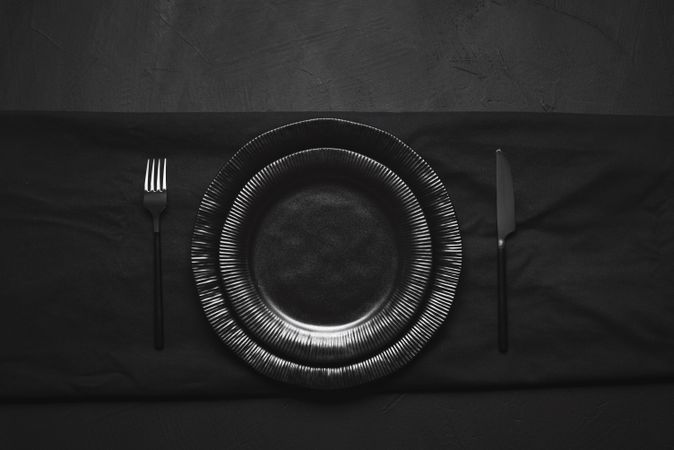 Dark plates and cutlery