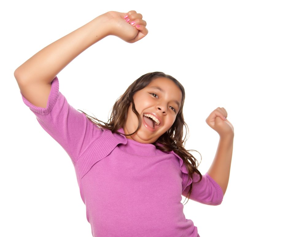 Happy Hispanic Girl Dancing Isolated