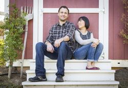 Interracial Couple Relaxing on the Steps