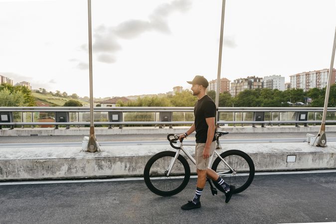 Man walking with bike