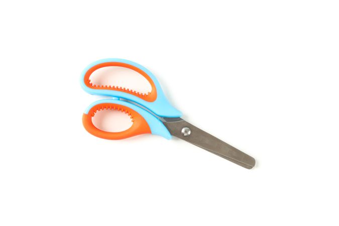 Stationery color scissors isolated on plain background