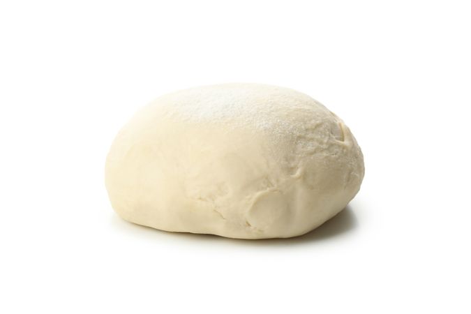 Fresh dough ball isolated on plain background