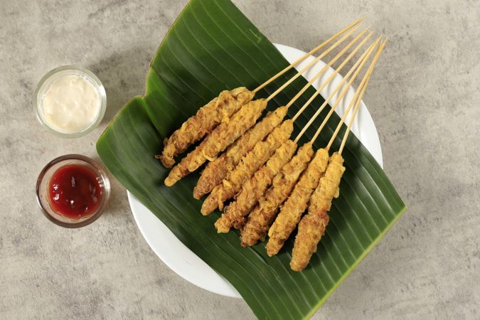 Telur gulung, rolled egg with skewers