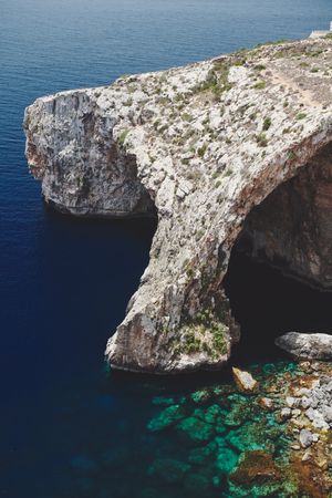 Cave eroded in cliffs on the Mediterranean coast, vertical